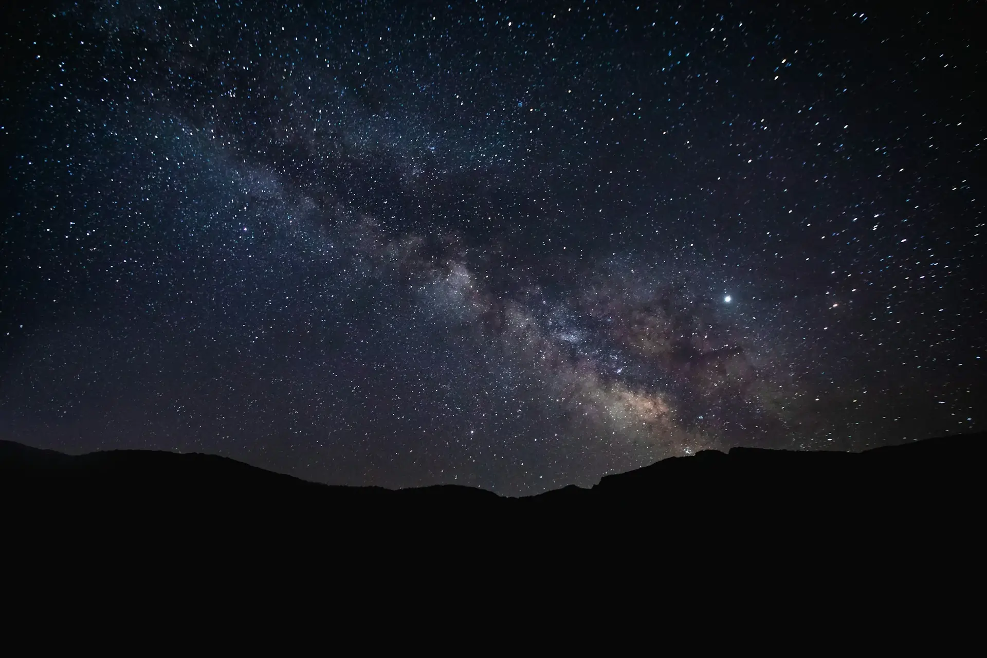 Stunning night sky with visible Milky Way over Balkan mountains